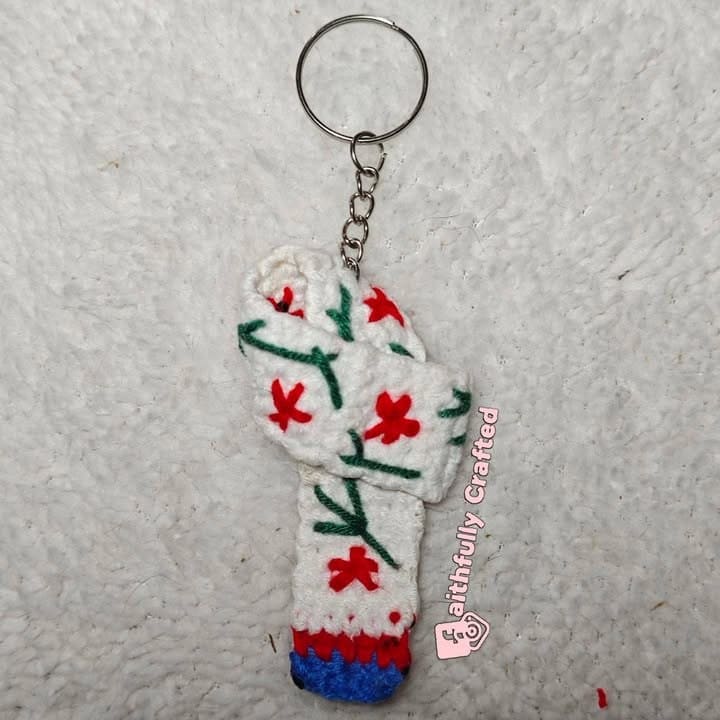 A few more shots of our PAL Cabin Crew Scarf — handmade crochet keychains by Faith